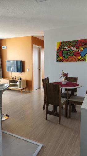 Μια τηλεόραση ή/και κέντρο ψυχαγωγίας στο Appartement tout confort au bord de mer