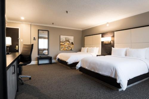 Postel nebo postele na pokoji v ubytování Crowne Plaza Hotel Moncton Downtown by IHG