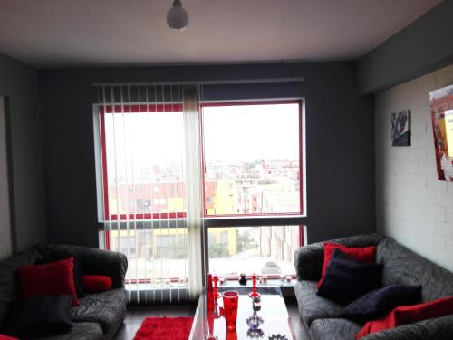 Et opholdsområde på Cozy Room - Margot Arimborgo