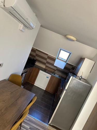Η κουζίνα ή μικρή κουζίνα στο Kehida Relax Apartmanház