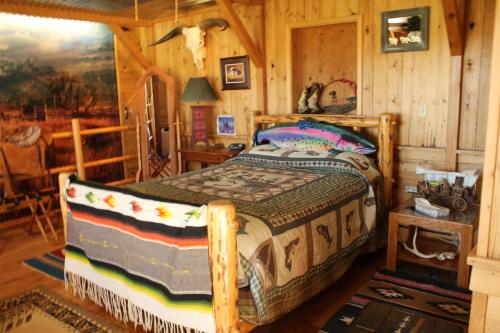 Postel nebo postele na pokoji v ubytování K3 Guest Ranch