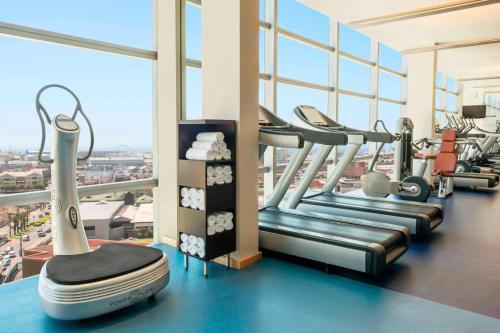 a gym with cardio equipment in a building at The Westin Cape Town in Cape Town