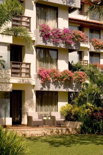 a building with flowers on the side of it at The Westin Resort Nusa Dua, Bali in Nusa Dua