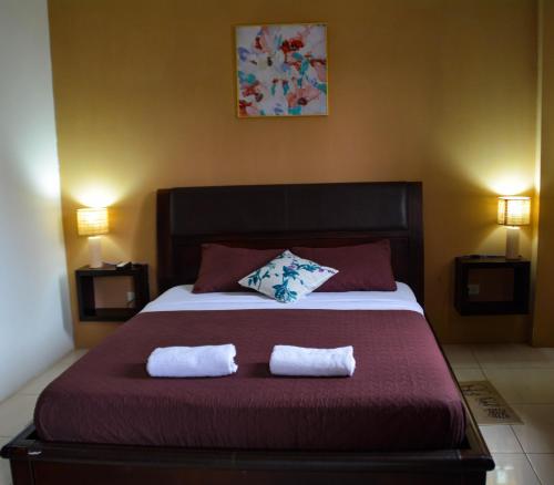 En eller flere senge i et værelse på Alojamiento Piquero Azul