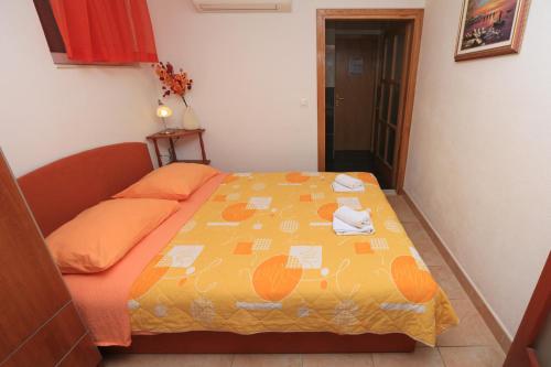 Katil atau katil-katil dalam bilik di Apartments Andrijašević