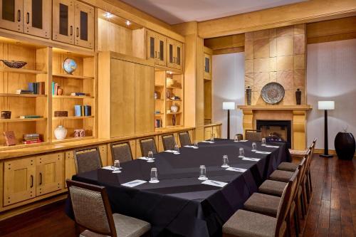 a large room with a long table and chairs at The Westin Westminster in Westminster