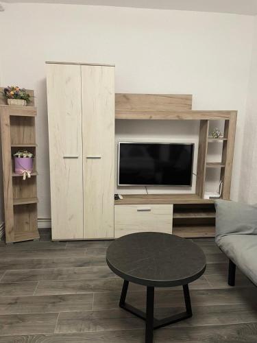 TV a/nebo společenská místnost v ubytování Apartament Bella