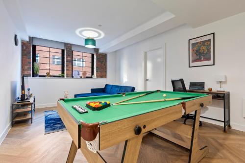 a living room with a pool table in it at Signature Suite- City Centre, Pool Table, Canal, Netflix Sleeps 7 in Birmingham