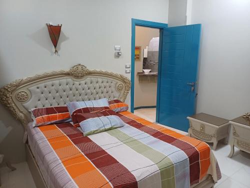Postel nebo postele na pokoji v ubytování New Villa Carimo