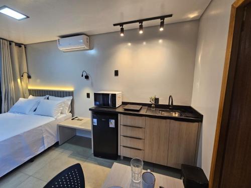 Ένα ή περισσότερα κρεβάτια σε δωμάτιο στο Cabanas na Guarda