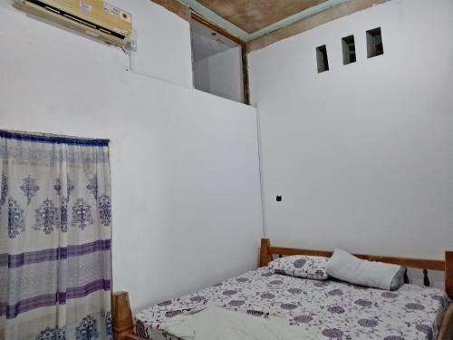 Postel nebo postele na pokoji v ubytování Rembo House