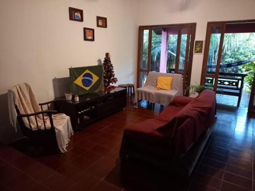 Χώρος καθιστικού στο Ubatuba Surf Hostel, apenas a 60 metros da praia da Lagoinha!