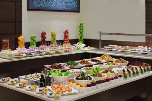 a buffet line with many different types of food at Residence Inn by Marriott Jazan in Jazan