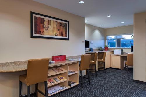 an waiting room at a dental office with chairs at TownePlace Suites Fayetteville Cross Creek in Fayetteville