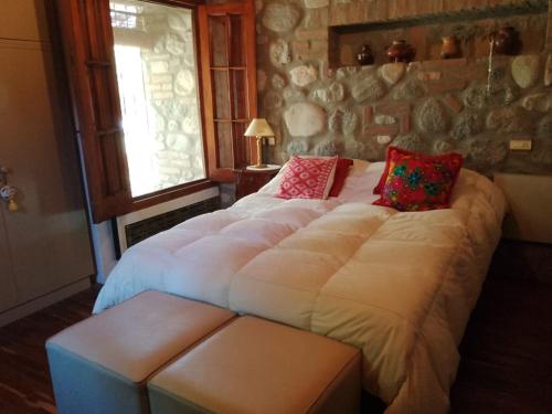 Ένα ή περισσότερα κρεβάτια σε δωμάτιο στο Casa de campo