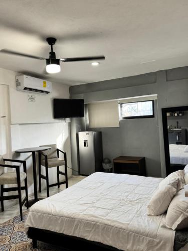 Postel nebo postele na pokoji v ubytování Apartamentos 31