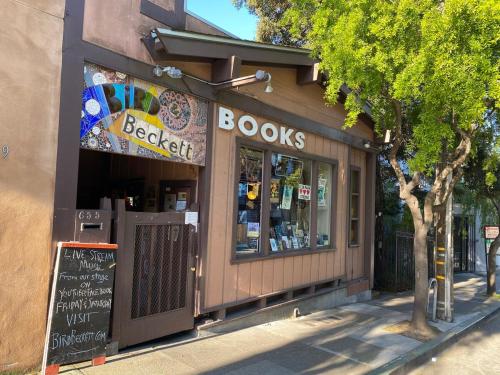 a book store with a sign on the front of it at Historic house, surrounded by nature with a hot tub in San Francisco