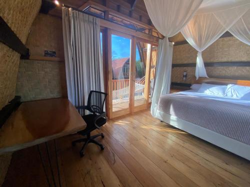 Ένα ή περισσότερα κρεβάτια σε δωμάτιο στο Welcoming and comfortable chalet in center Uluwatu