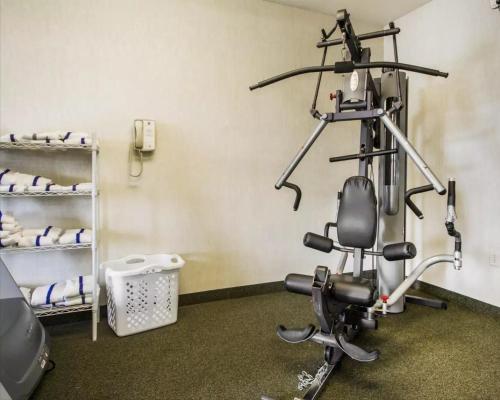 a room with a gym with a exercise bike at Comfort Inn & Suites Madison North in De Forest