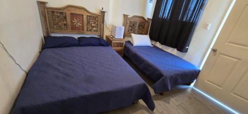 Postel nebo postele na pokoji v ubytování Casita Angel Del Mar