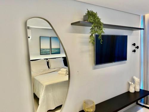 TV a/nebo společenská místnost v ubytování Alta Garden- Pé Na Areia-Miramar Hospedagens