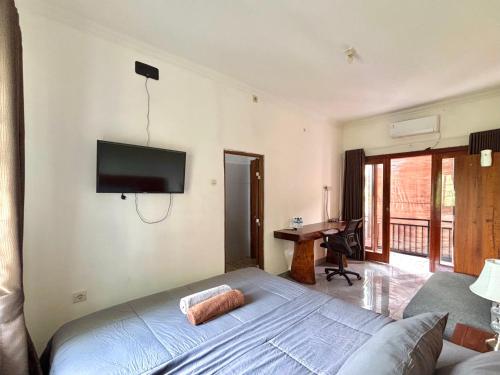 Μια τηλεόραση ή/και κέντρο ψυχαγωγίας στο Jingga Guesthouse