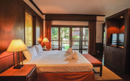 Katil atau katil-katil dalam bilik di Suan Bua Hotel & Resort