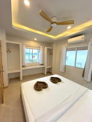 Ένα ή περισσότερα κρεβάτια σε δωμάτιο στο Euphoria Bungalow