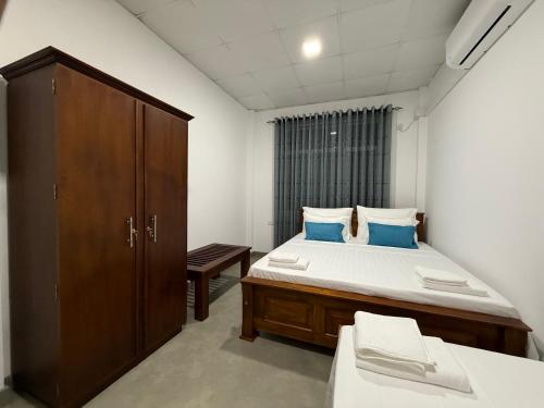 Postel nebo postele na pokoji v ubytování CHERN GUEST HOUSE - Madiha