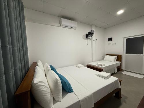 Postel nebo postele na pokoji v ubytování CHERN GUEST HOUSE - Madiha
