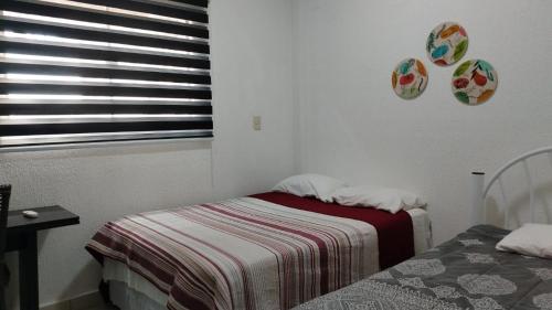 Postel nebo postele na pokoji v ubytování Stefanich Aparthotel 51