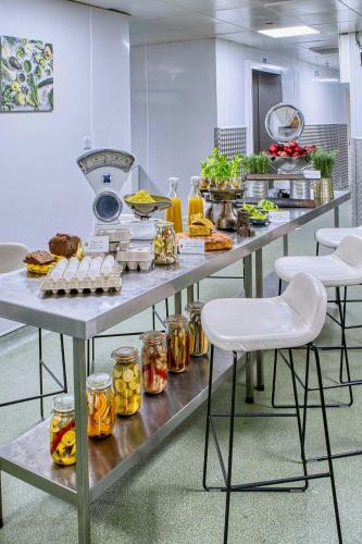 a table with food on it in a kitchen at London Heathrow Marriott Hotel in Hillingdon