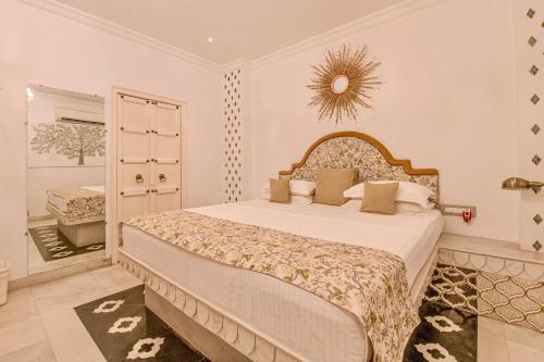 Cama o camas de una habitación en Jagat Niwas Palace