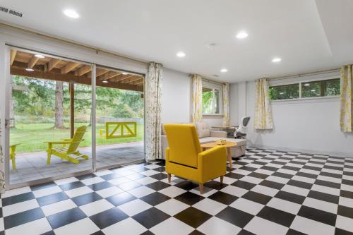 a living room with a checkered floor at Family friendly house with MIL suite in Sammamish