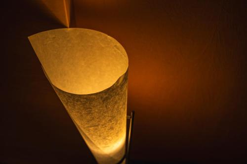 a close up of a lit up lamp at KOKO HOTEL Premier Kanazawa Korinbo in Kanazawa
