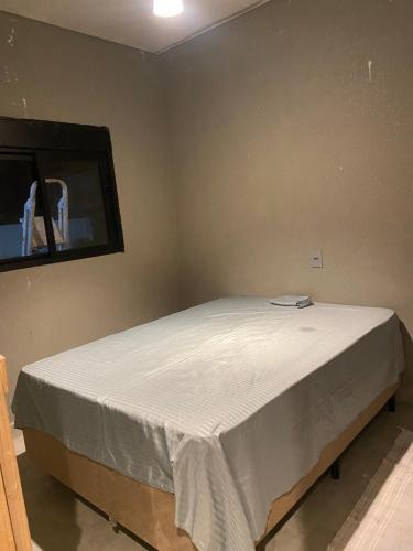 Postel nebo postele na pokoji v ubytování Casa em Caraguatatuba 3