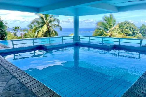 Bazén v ubytování Studio Sunny - pool - wifi - AC Papeete nebo v jeho okolí