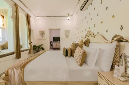 Cama o camas de una habitación en Jagat Niwas Palace