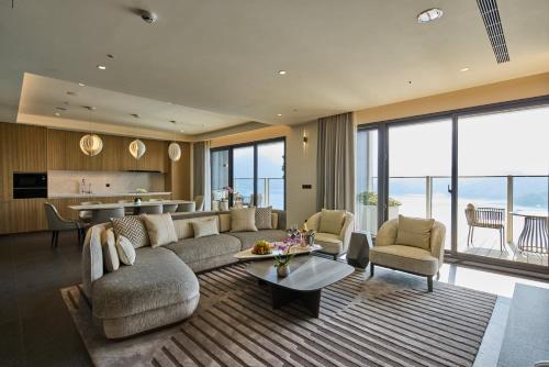 a living room with a couch and a table at Grand Hilai Sun Moon Lake in Yuchi