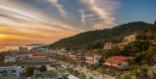a view of a town with a mountain at BlueSotel Krabi AoNang Beach in Ao Nang Beach