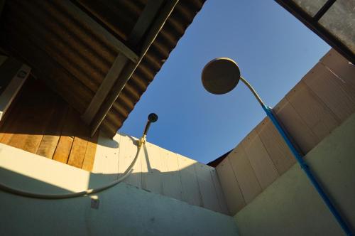 a light in a building with a street light at ComeOn Stay&Sleep in Chiang Rai