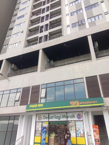 a building with a sign in front of it at Nilai 青年城 Youth City C 25 15 in Nilai
