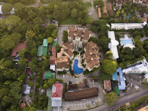 an overhead view of a city with houses and trees at Sunrise 1- 3 Bedroom Poolside Condo in Tamarindo
