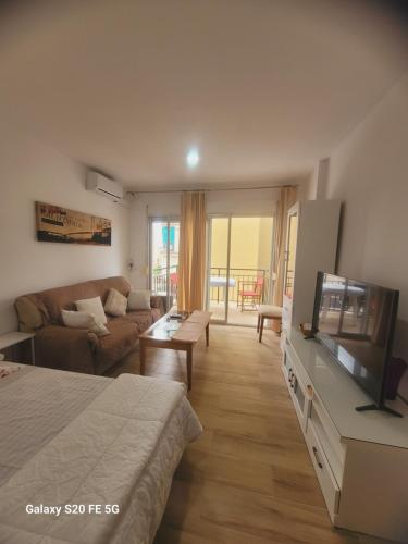 Ένα ή περισσότερα κρεβάτια σε δωμάτιο στο Apartamento manantiales