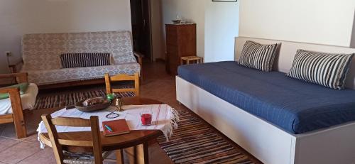 A seating area at Magnolia Traditional Stone House in Vamvakou