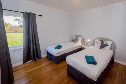 Ένα ή περισσότερα κρεβάτια σε δωμάτιο στο Diamond Hills Campbell Town
