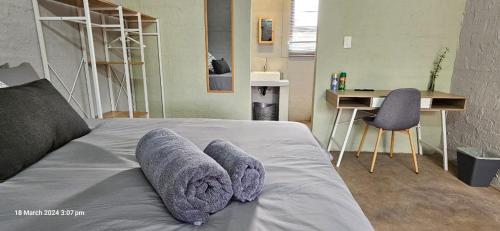 Postel nebo postele na pokoji v ubytování Kolope Lodge