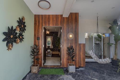 Imagen de la galería de ELIVAAS Moonlit retreat 3 BHK with Garden & Pool, en Alibaug