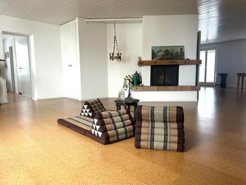 a living room with a couch and a table at Wohnung in Burgdorf beim Schloss in Burgdorf