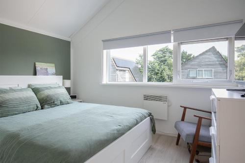 Postel nebo postele na pokoji v ubytování Beautiful holiday home Friesland